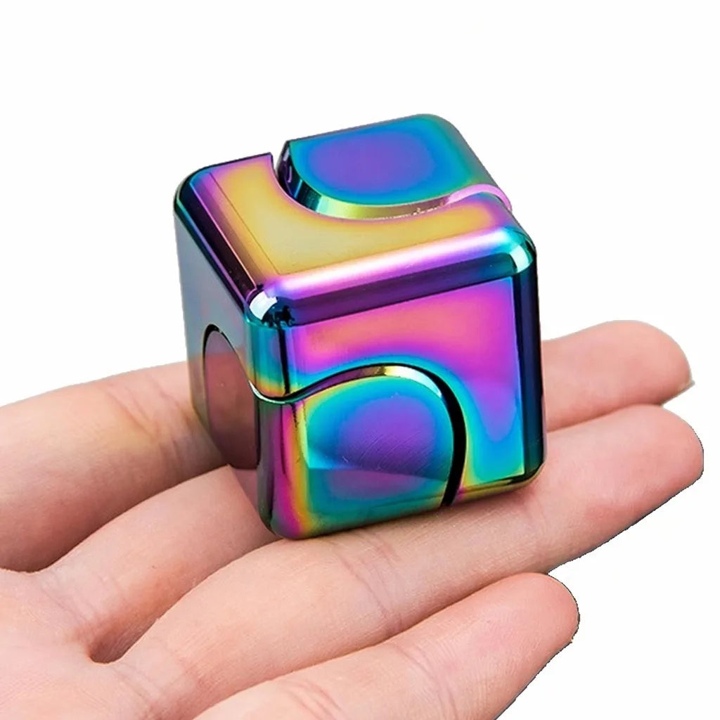 MataFlick Metal Fidget Cube — hand-held macro detail shot