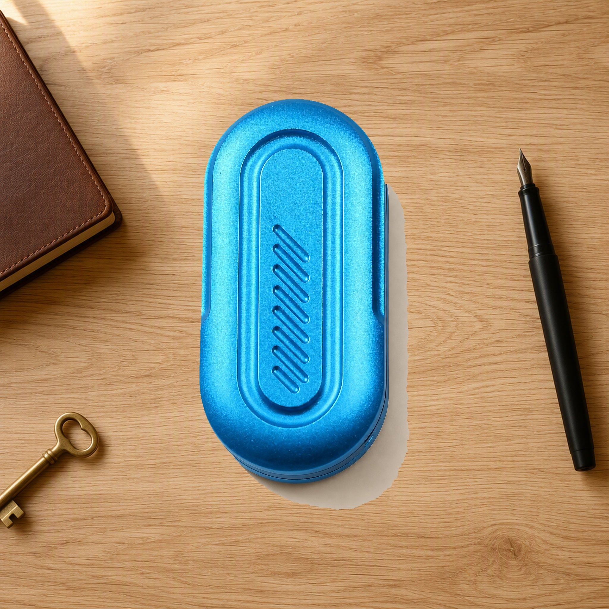 Capsule fidget slider EDC desk blue