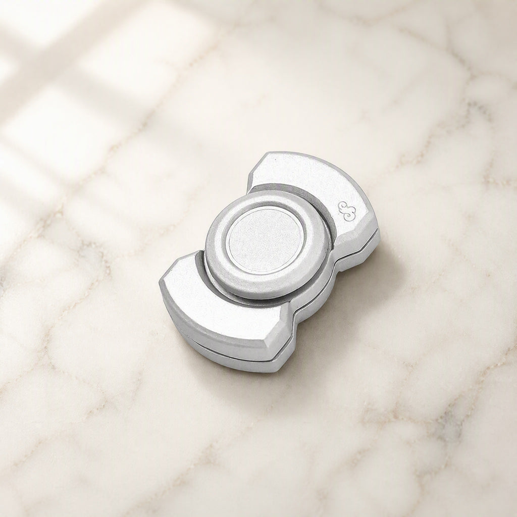 Bar fidget spinner on marble surface
